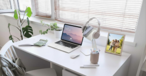 clean desk with a locked secure computer and phone setup